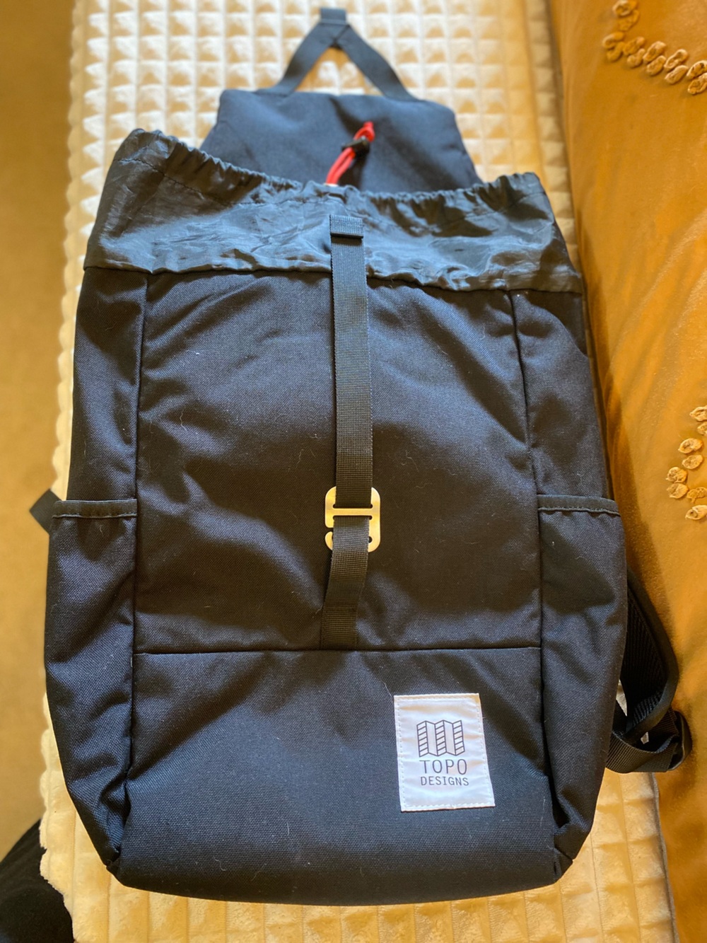 Black Backpack with Silver Buckle and Rivian Logo